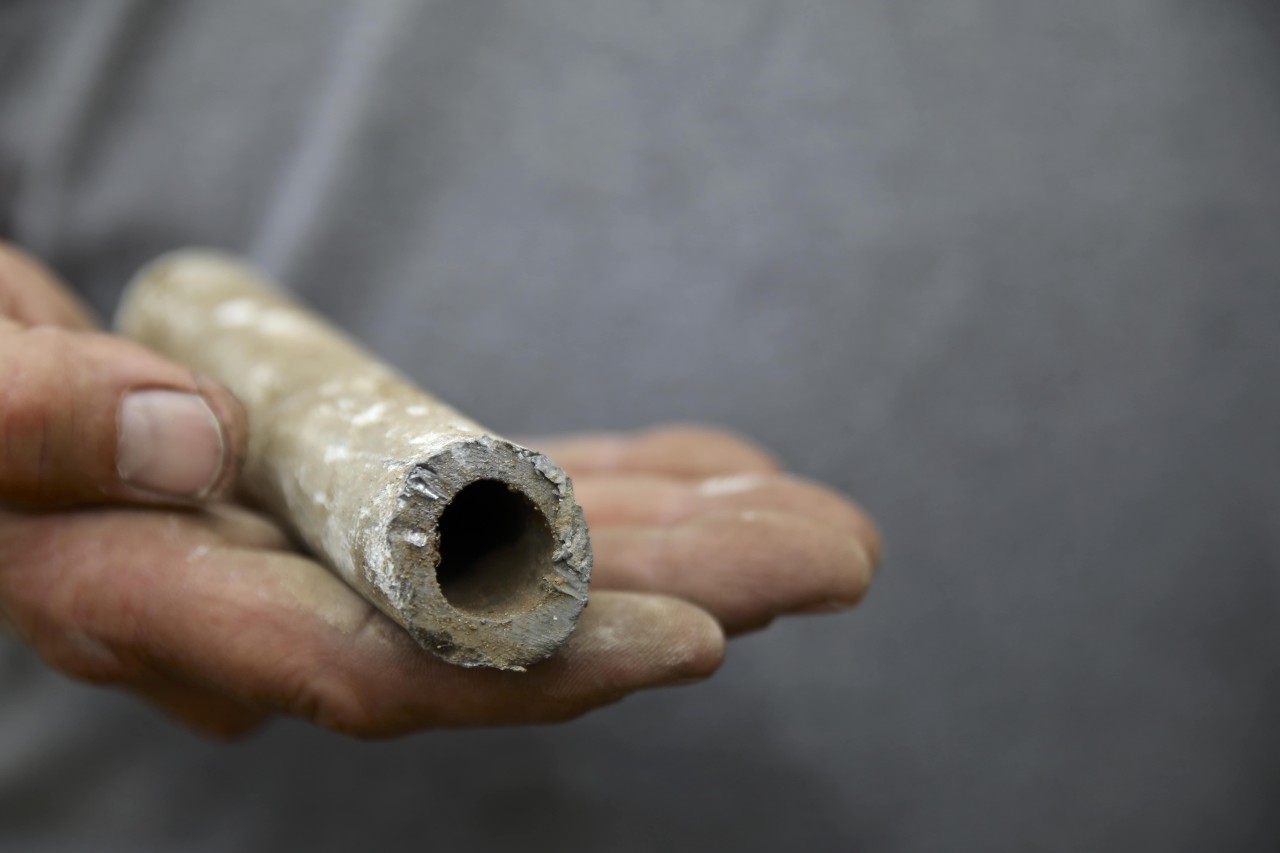 A closeup image of lead water pipe.